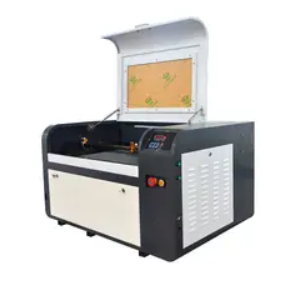 laser engraving machine for a thin mirror